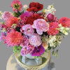 Purple tulips, pink dahlia, purple spray roses and lavender ranunculus. Very beautiful