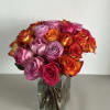 A breathtaking arrangement of roses in glass vase for that special someone.