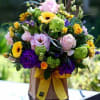 Gift someone special this arrangement that is bursting with color and personality.