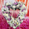 This is a beautiful Funeral- Heart design with mix flowers. (Medium Size)