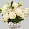 This set of white centerpieces comes with 23 fresh stems arranged in