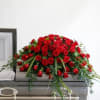 This incredible full casket spray from the Radiance Collection is stunning with