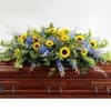 This incredible casket spray from the Summer Fields Collection is stunning with