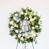 This stunning wreath from the Tranquility collection are lush with fragrant white