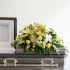 This incredible casket spray from the Many Blessings Collection is stunning with