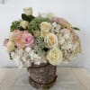 Seasonal  blush and white flower blend arranged in a custom made