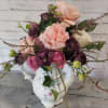 Your loved ones will love this whimsical arrangement in a beautiful vintage