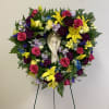 This is an Easel Arrangement.  The wreath is an 18" heart