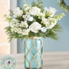 beautiful sea inspired vase with white flowers 