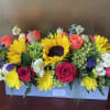 Sunny sunflowers, orange and red roses roses, yellow chrysanthemums and more -