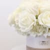 Bring beauty to the table with elegant arrangement, presented in a round