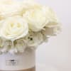Bring beauty to the table with elegant arrangement, presented in a round