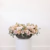 Bring beauty to the table with elegant arrangement, presented in a long