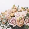 Bring beauty to the table with elegant arrangement, presented in a long