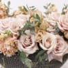Bring beauty to the table with elegant arrangement, presented in a long