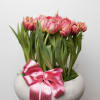 Bring beauty to the table with elegant arrangement, presented in a round