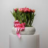 Bring beauty to the table with elegant arrangement, presented in a round