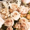 Bring beauty to the table with elegant arrangement, presented in a championship