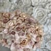 Bring beauty to the table with elegant arrangement, presented in a ceramic