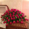 This Classic Spray of Brilliant Red Roses makes a Striking and Dignified