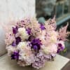 Immerse yourself in the regal charm of the &quot;Regal Tranquility&quot; arrangement, a
