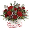All aboard for Christmas fun! This sweet metal sled joyfully delivers a