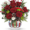 Send your loved one a festive holiday gift of blooms in a