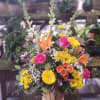 A basket of Snapdragons, Queen Ann&#039;s Lace, Daisies, Roses, Lilies, Austromeria, Salal