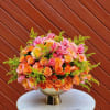 Bouquets and compositions of autumn flowers in a golden vase will decorate