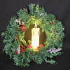 Christmas lightup night wreathes with artificial candles to highlight the holiday season.