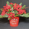 Classic artificial poinsettia in bucket pot