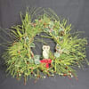 Nontraditional wreath with wispy grass and owl