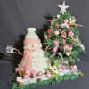 Modern day pink snowman scene with snow and trees