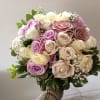 Beautiful pale pastel colors roses hand tied round presentation bouquet, can be