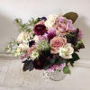 Sophisticated and classy purples in vintage handtied round bridal bouquet