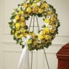 Send a sunny sympathy wreath spray to show your love. Bright, yellow