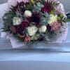 This beautiful korean wrapped bouquet is designed with Lilies, peonies, garden roses
