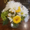 A small happy bouquet with an assortment of white, greens and yellows.