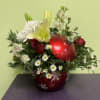 This bouquet is in a one of a kind, hand crafted, holiday