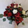 Tall latte winter decorated cup with the festive Christmas/New Year arrangement