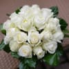 Make a bold statement with this elegantly simple design. White roses symbolize
