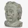 Lush mound of seasonal floral with greenery accent in Einstein head vase.
Vase