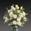 A stylish pop of winter style, this snow-white bouquet in a silver