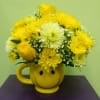 Smile! Shine the spotlight down with this glowing bouquet of shiny yellow