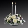 Blanket your holiday table in elegance with this lush white floral Christmas