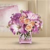 Impossibly pretty. This decidedly feminine arrangement is absolutely delightful. Perfectly peachy peach