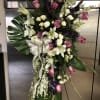 Purple and white standing spray with glasdiolas, roses, spray roses lily&rsquo;s and