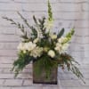 This traditional box container is brimming with beautiful blooms in neutral tones.