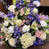 
Orient This dramatic arrangement includes lavender roses, lavender stock, lavender cushion, hydrangea