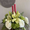 This arrangement is a breathtaking festive centerpiece. The bouquet is composed of